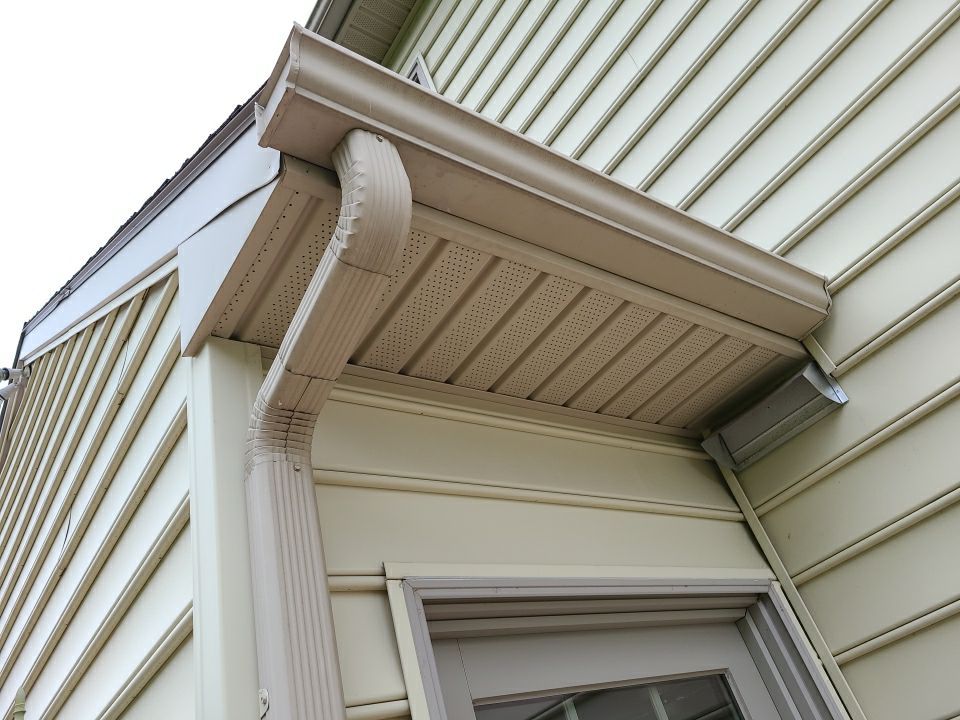 Close-up of soffit and fascia installation on a residential home