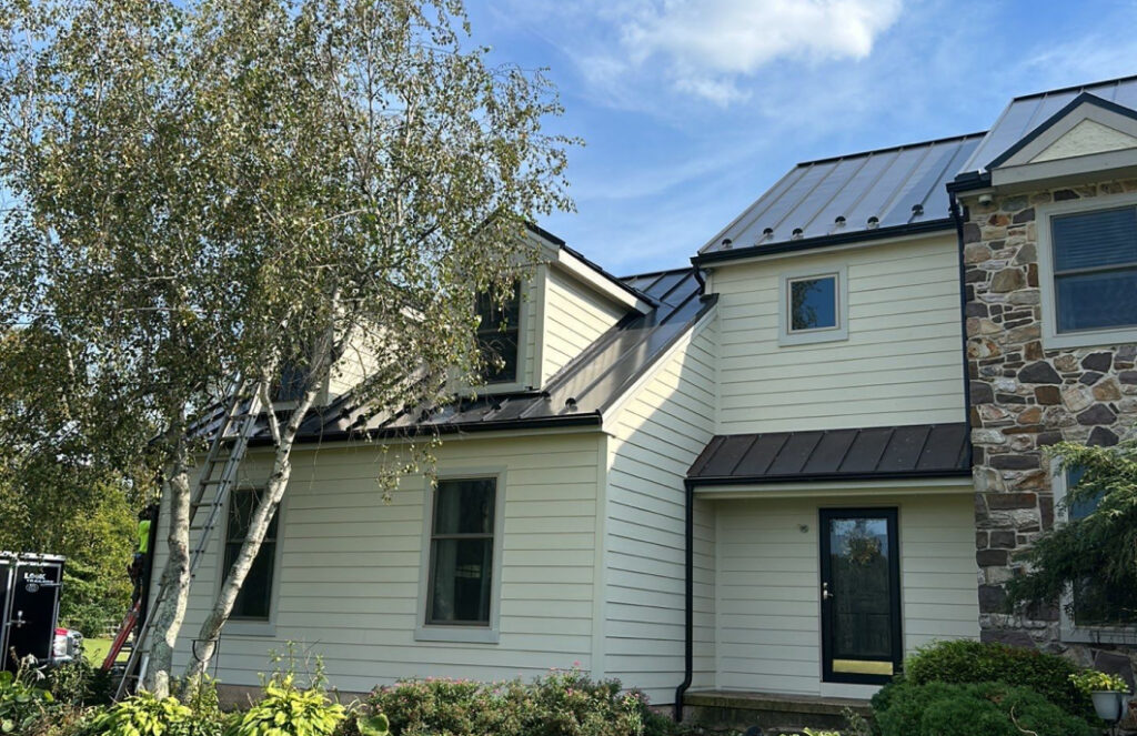 Exterior view of a home with high-quality siding installed by Zimmerman's Roofing