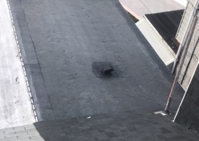 Flat rubber roof replacement.