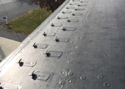 Flat roof with ice dams.
