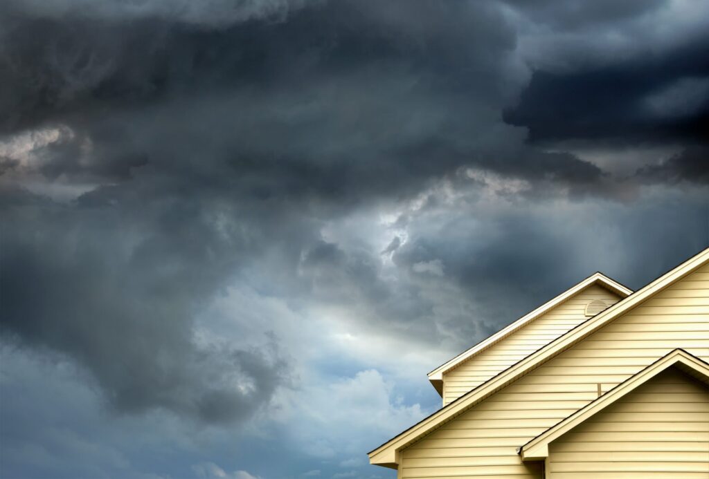 close up shot from single family house exterior over stormy sky